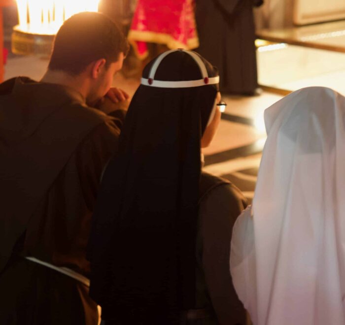 praying praying at the holy land pilgrimage tour