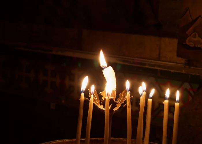 candles-sepulchre votive lights at the Holy Sepulchre holy land pilgrimage tour