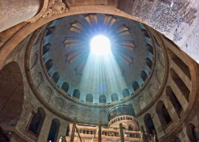 Church of the Holy Sepulchre with sunlight ray from above Church of the Holy Sepulchre sunlight Holy Land pilgrimage tour