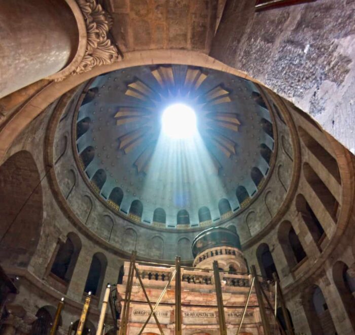 Church of the Holy Sepulchre with sunlight ray from above Church of the Holy Sepulchre sunlight Holy Land pilgrimage tour