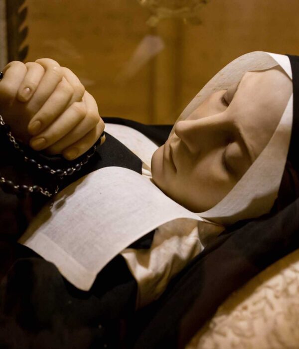 bernadette-rosary-lourdes St Bernadette with rosary in repose at Lourdes pilgrimage tour