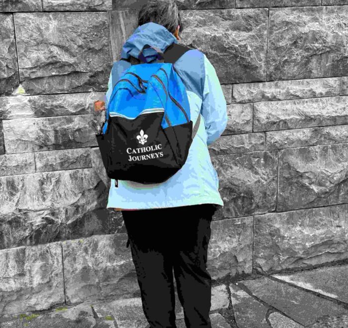 lourdes-holy-water lourdes holy water person pilgrimage tour