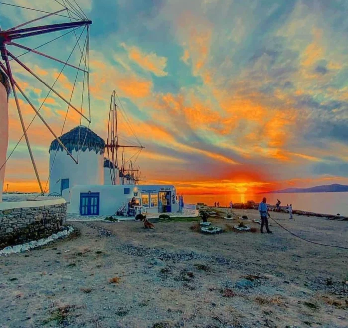 mykonos-sunset-windmills Mykonos sunset with windmills greece pilgrimage tour