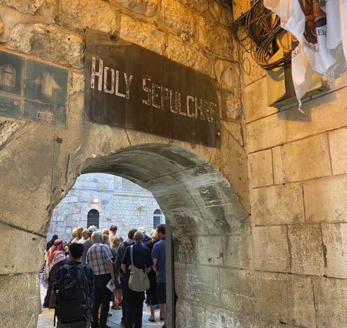 Holy-sepulchre-sign-jerusalem-holy-land entrance holy sepulchre jerusalem on holy land pilgrimage tour