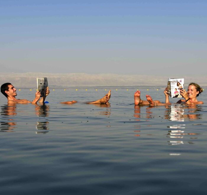 Tourists-float-Dead-Sea Floating in Dead Sea Jordan
