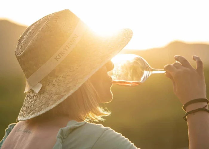 woman-drinking-kir-yianni woman drinking wine pilgrimage